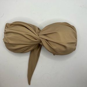 Bought in Maui from local San Lorenzo shop. Size small. Tan.